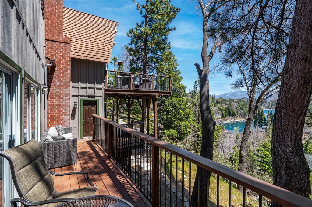 27550 North Bay Road Lake Arrowhead, CA 92352 - Photo 43 of 53 a view of a balcony with furniture