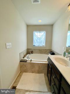 4803 Wensel Road Fredericksburg, VA 22408 - Photo 6 of 7 Serene bathroom with natural light.
