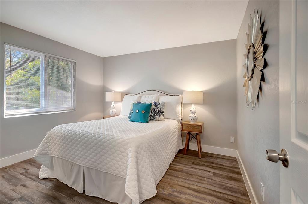 16133 Ravendale Drive Tampa, FL 33618 - Photo 32 of 46 a bedroom with a bed and a window