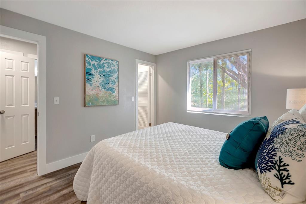 16133 Ravendale Drive Tampa, FL 33618 - Photo 33 of 46 a bedroom with a bed and a window