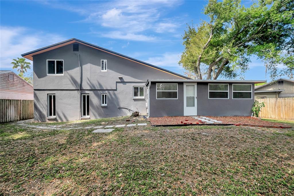 16133 Ravendale Drive Tampa, FL 33618 - Photo 41 of 46 a view of a house with backyard