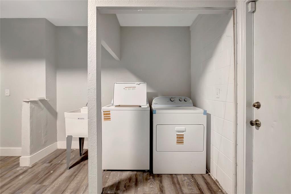 16133 Ravendale Drive Tampa, FL 33618 - Photo 45 of 46 a utility room with dryer and washer