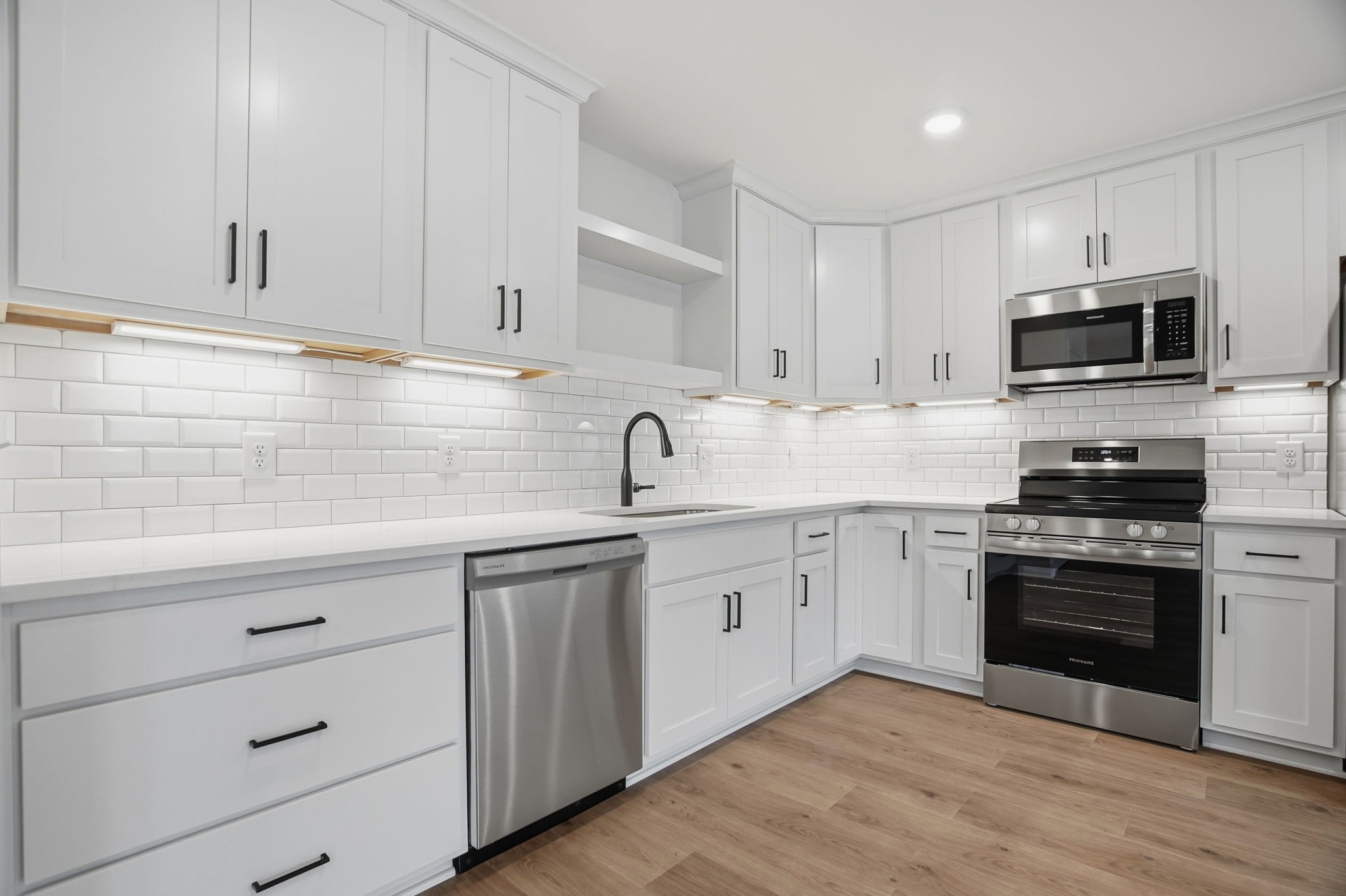 2139 Rylee Way, Unit 6 Greenbrier, TN 37073 - Photo 14 of 32 a kitchen with appliances a sink and cabinets