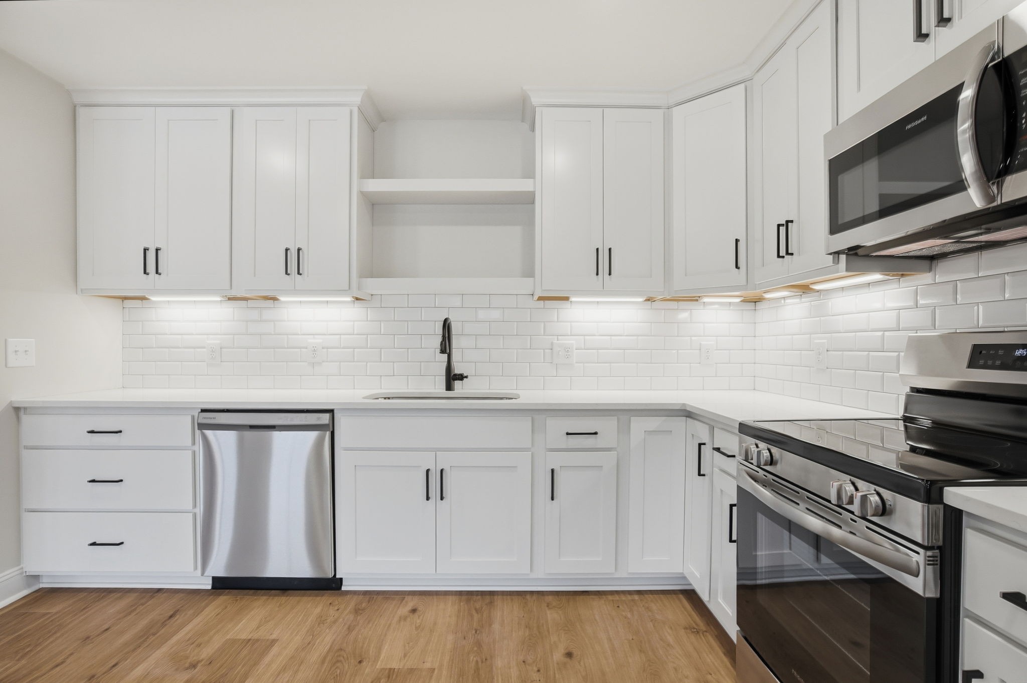 2139 Rylee Way, Unit 6 Greenbrier, TN 37073 - Photo 15 of 32 a kitchen with granite countertop white cabinets and stainless steel appliances