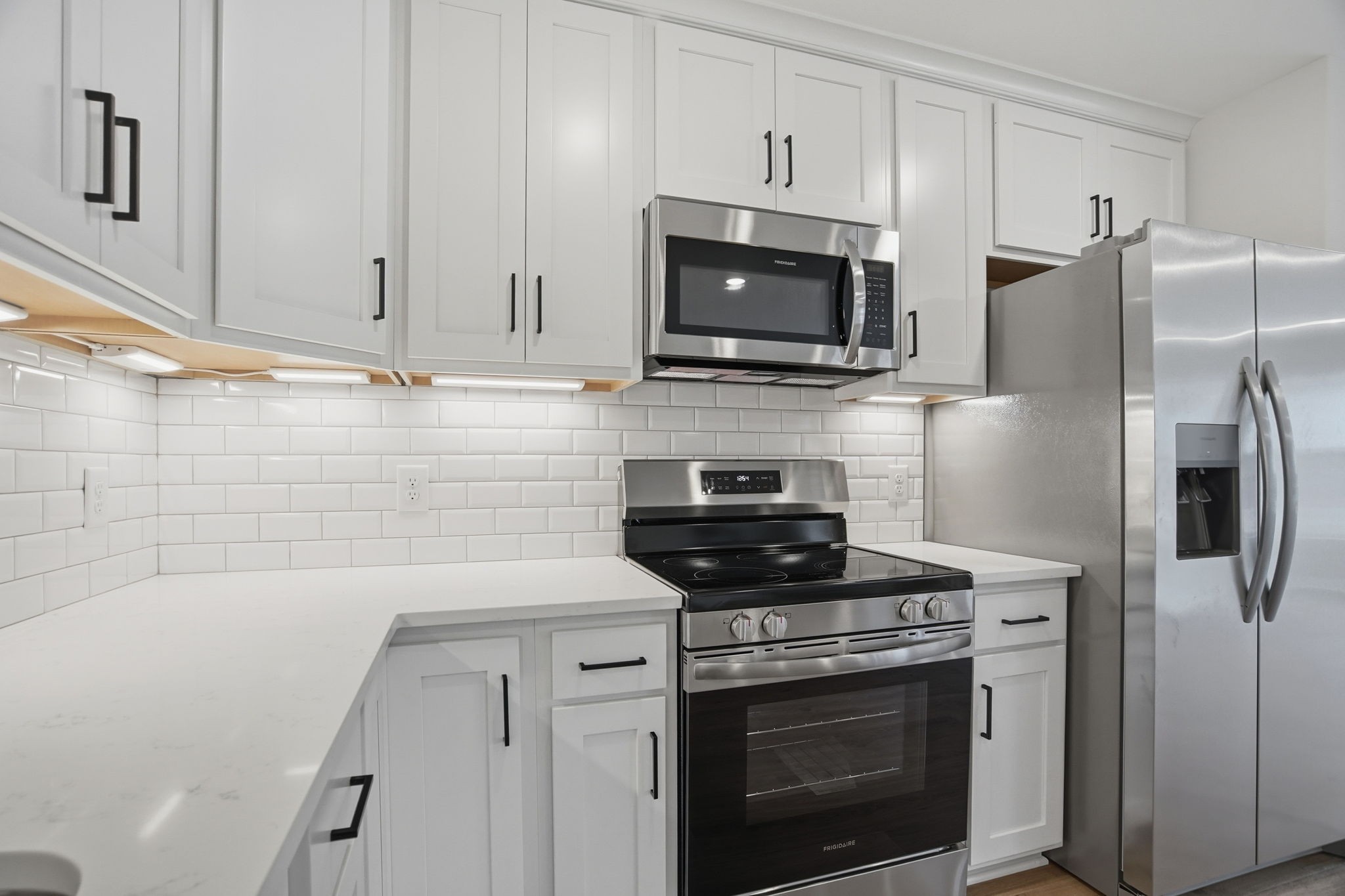 2139 Rylee Way, Unit 6 Greenbrier, TN 37073 - Photo 16 of 32 a kitchen with cabinets stainless steel appliances and a counter space