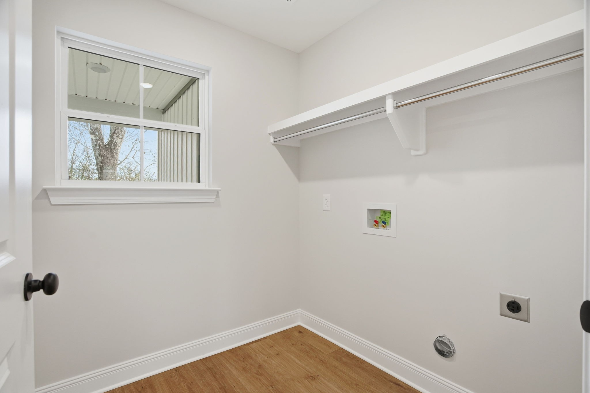 2139 Rylee Way, Unit 6 Greenbrier, TN 37073 - Photo 18 of 32 a bathroom with a window and vanity