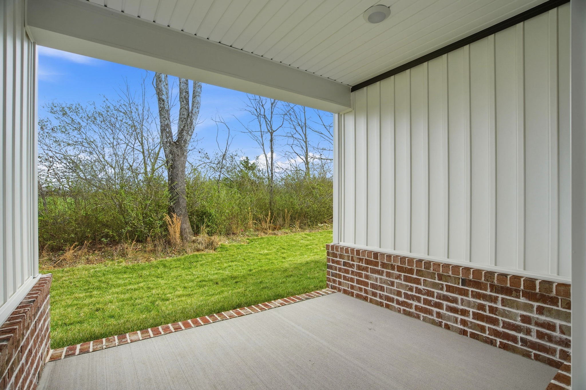 2139 Rylee Way, Unit 6 Greenbrier, TN 37073 - Photo 29 of 32 a view of a back yard from a room