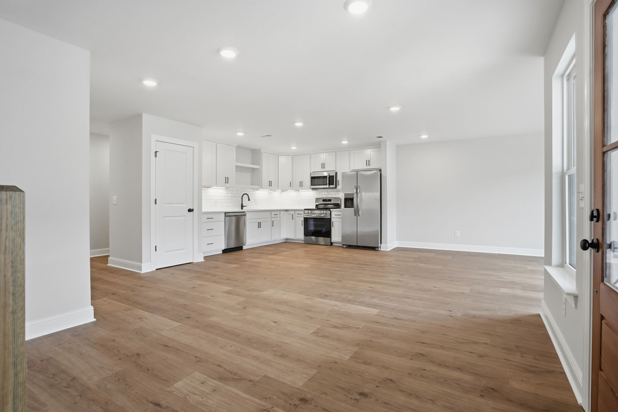 2139 Rylee Way, Unit 6 Greenbrier, TN 37073 - Photo 7 of 32 a view of a kitchen with a sink and a refrigerator
