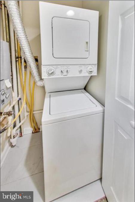 1720 H Street Northeast, Unit A Washington, DC 20002 - Photo 16 of 31 Efficient laundry setup in a compact space.