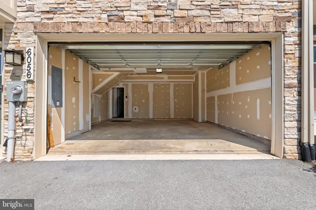 an entryway view with wooden floor