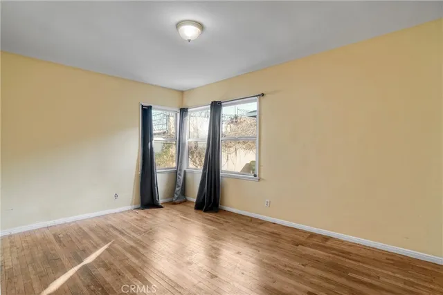 a view of a bathroom with a tub and shower