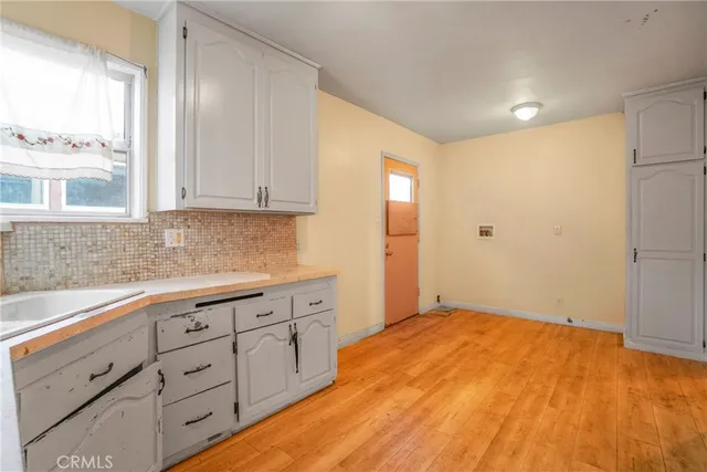 a bathroom with a sink and toilet