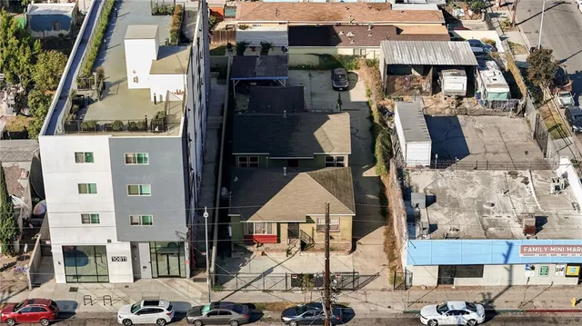 an aerial view of a city with lots of residential buildings