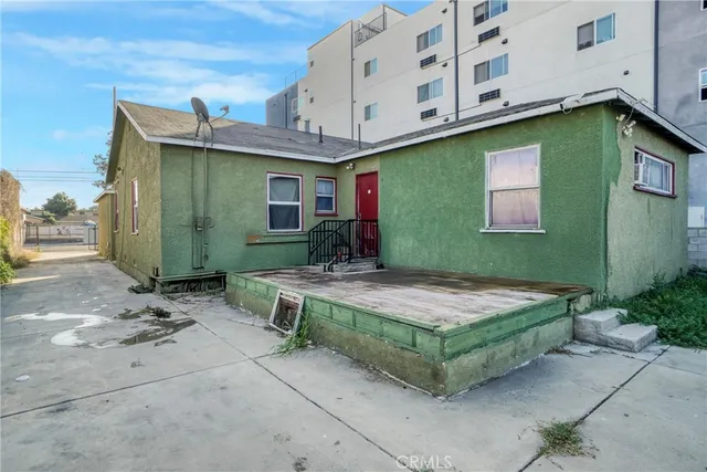 an aerial view of a city with lots of residential buildings