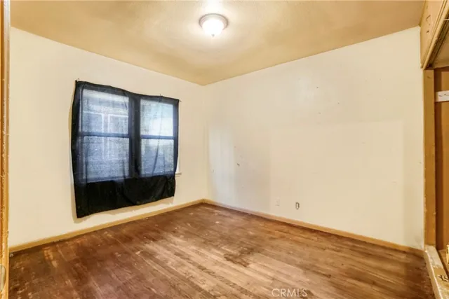 a kitchen with white cabinets