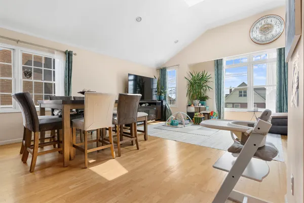 a view of a dining room with furniture window and outside view