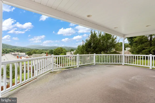a view of a blue door and a window