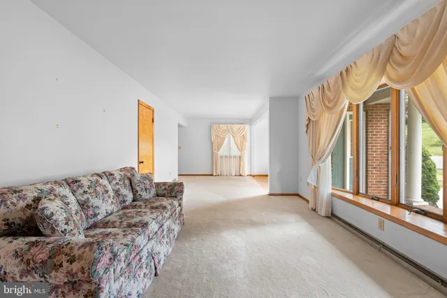 a view of livingroom with furniture window and outside view