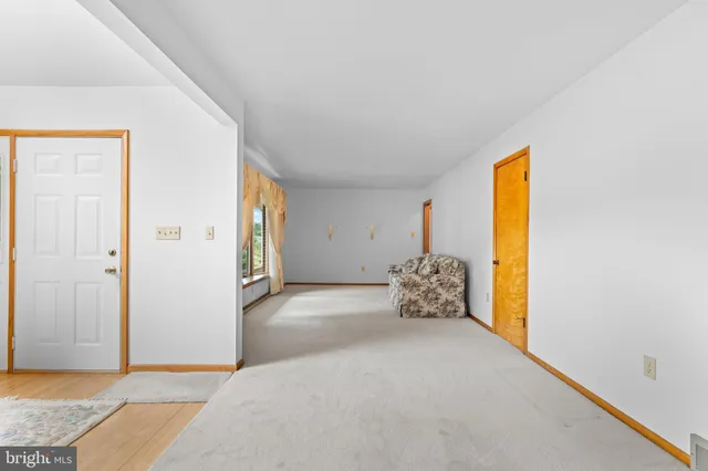 a kitchen with stainless steel appliances wooden cabinets and a stove top oven