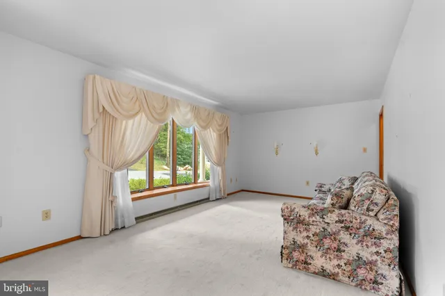 a kitchen with stainless steel appliances granite countertop a sink and a stove