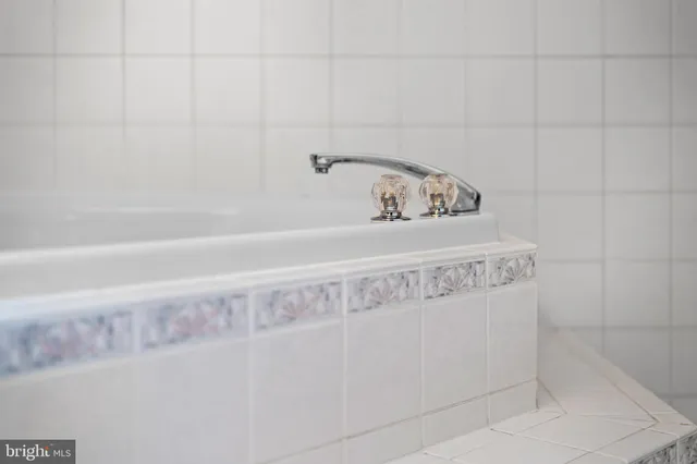 a view of a room with wooden walls