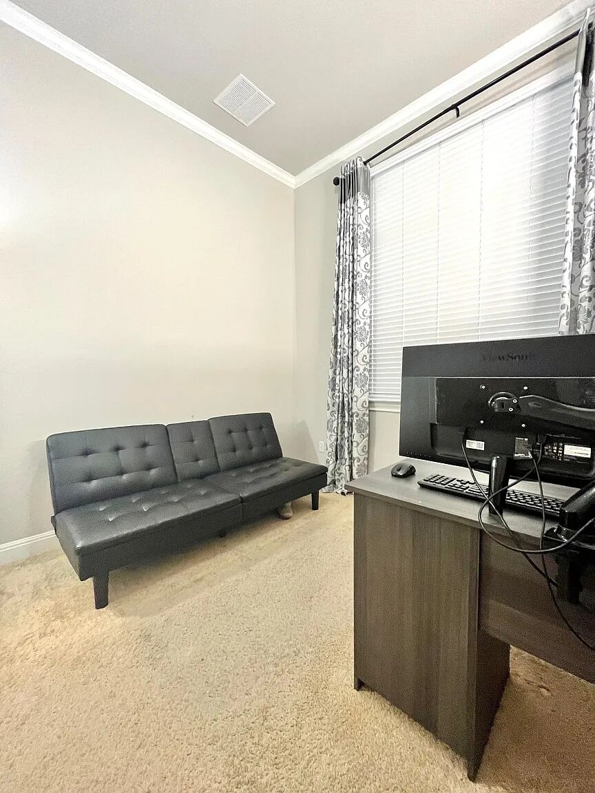 4221 Borho Ranch Street Leander, TX 78641 - Photo 6 of 16 This interior space features light-colored walls, crown molding, and carpeting