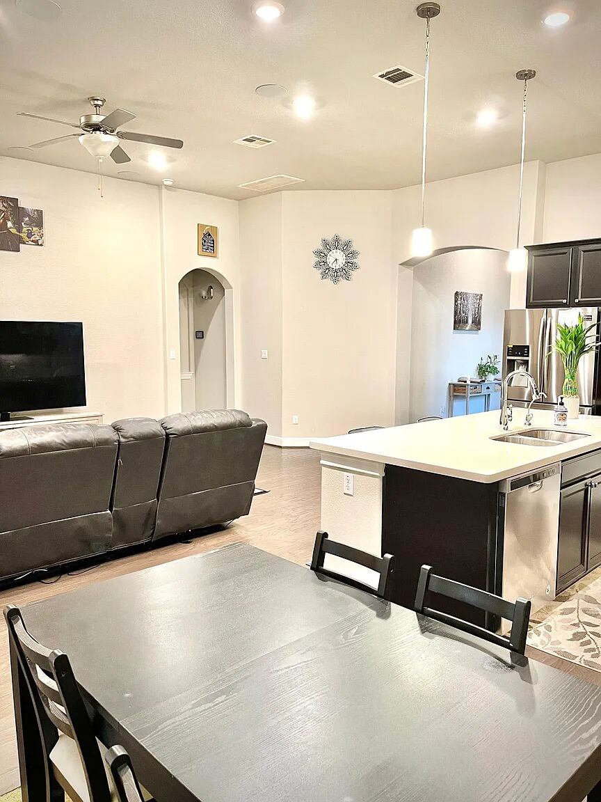 4221 Borho Ranch Street Leander, TX 78641 - Photo 9 of 16 Open concept living area featuring recessed lighting, a ceiling fan, and light-toned walls