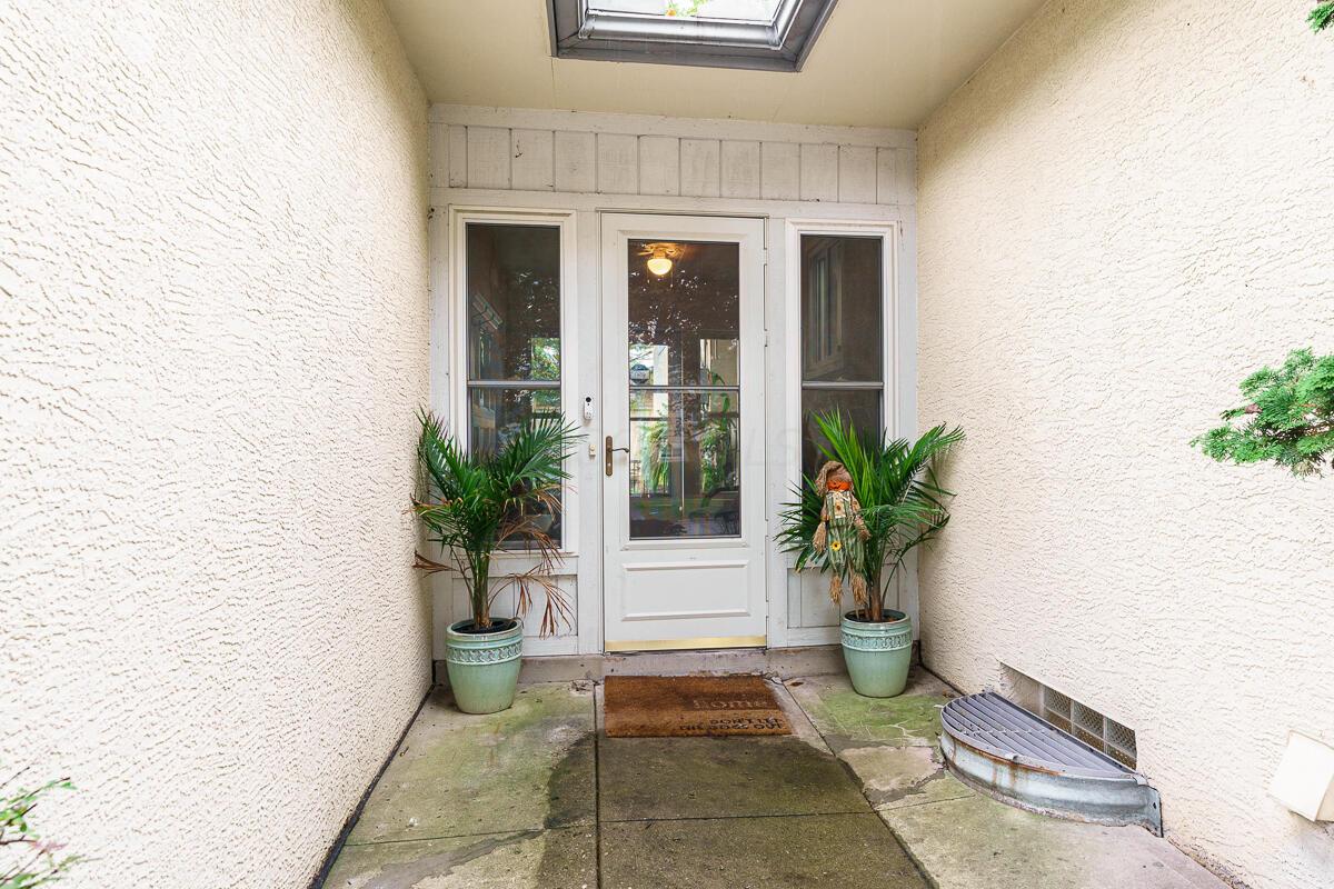 3090 North Star Road Columbus, OH 43221 - Photo 39 of 44 3090 door to sunroom