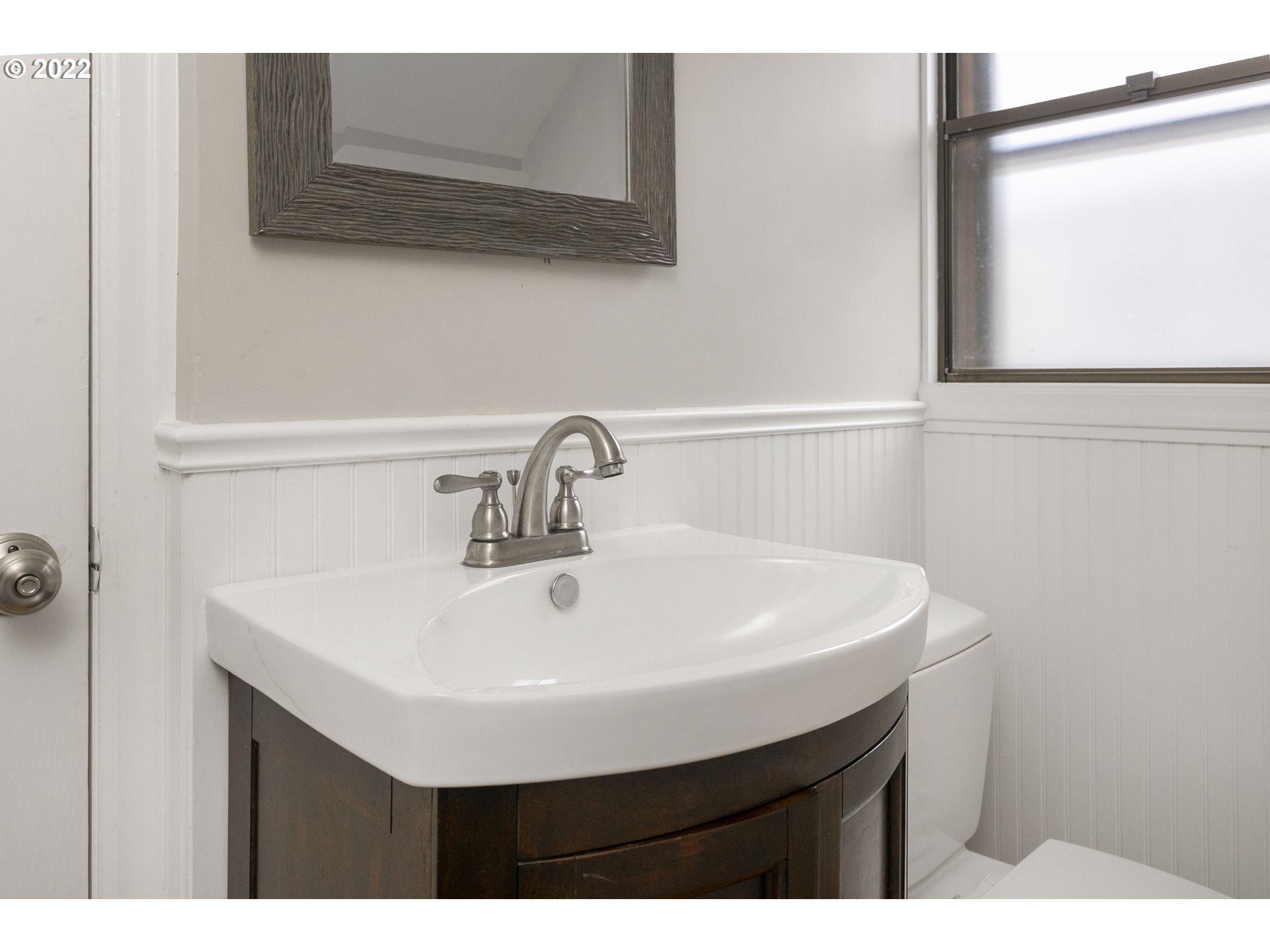 225 Southwest Carson Street Portland, OR 97219 - Photo 19 of 32 a sink with a microwave
