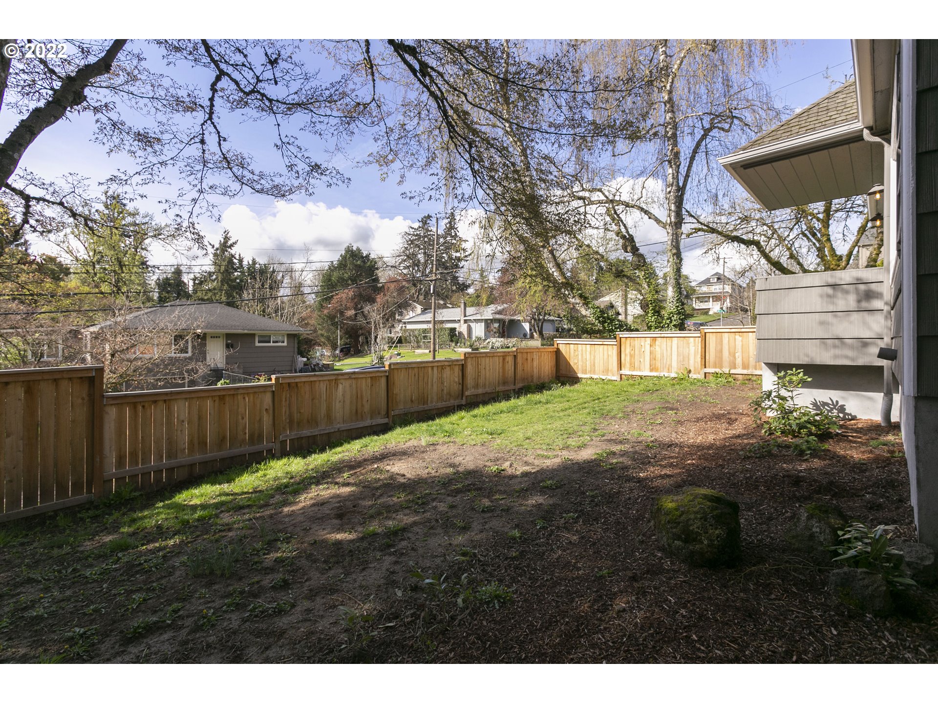 225 Southwest Carson Street Portland, OR 97219 - Photo 30 of 32 a view of a backyard