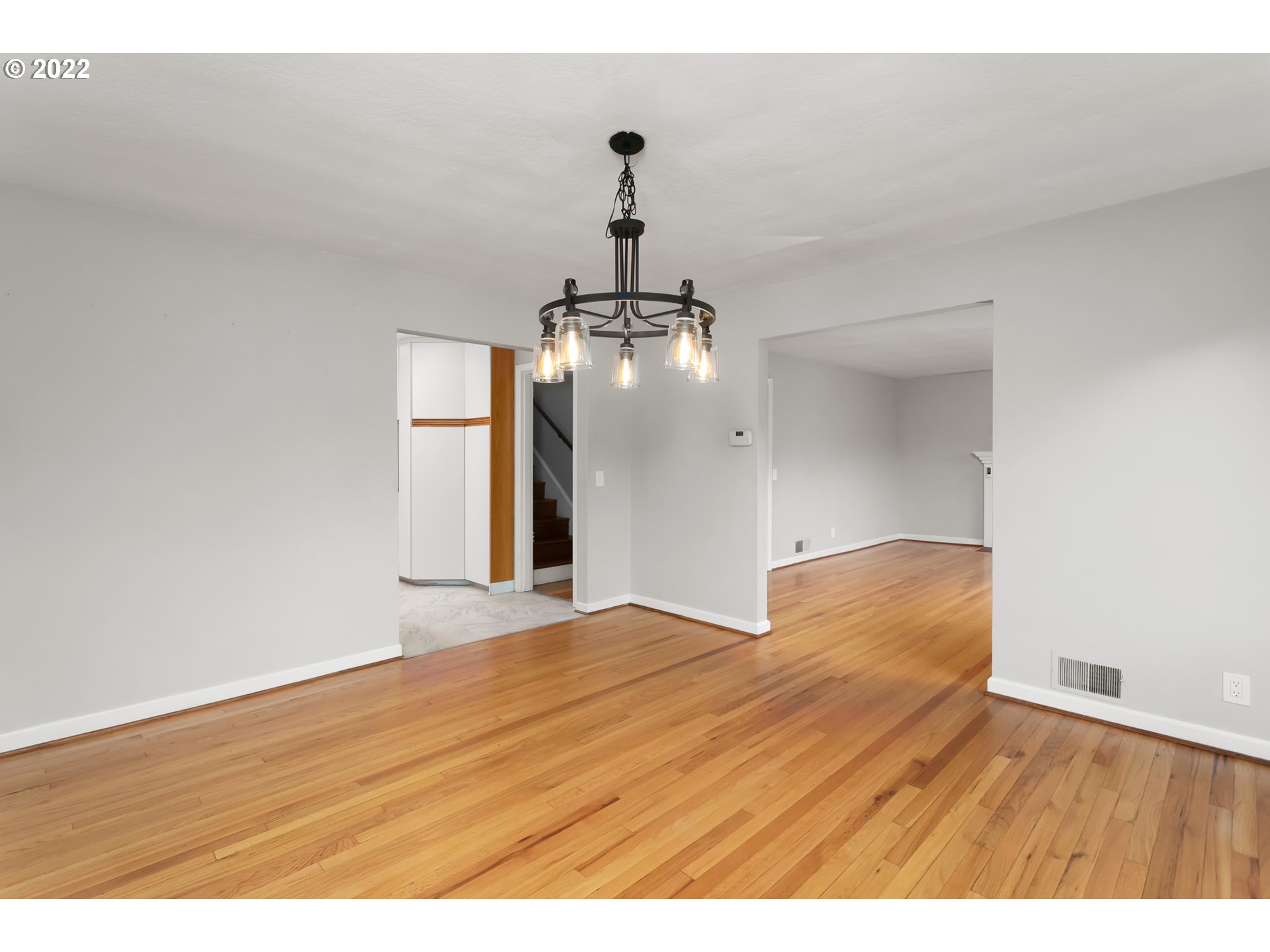 225 Southwest Carson Street Portland, OR 97219 - Photo 4 of 32 a view of empty room with wooden floor