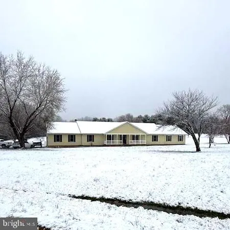 a view of a house with a patio