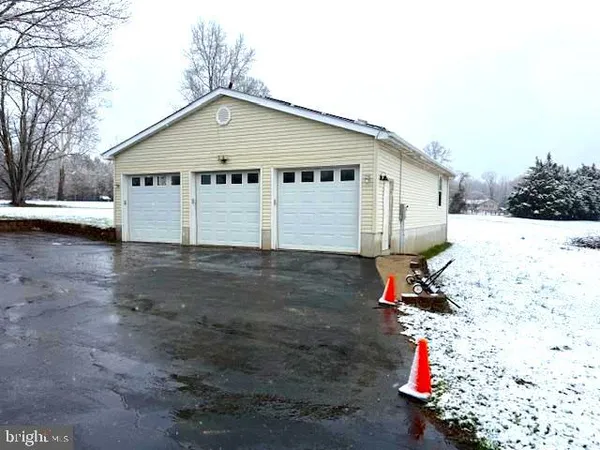 a view of a balcony with wooden floor