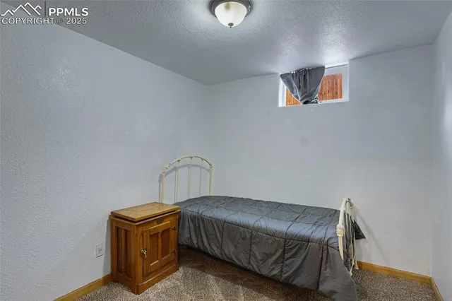 a view of a chairs and table in the patio