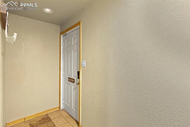 an aerial view of residential building and ocean