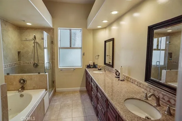 a bed room with a bed and a couch