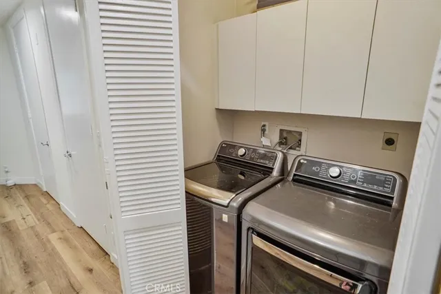 a bedroom with furniture and a book shelf