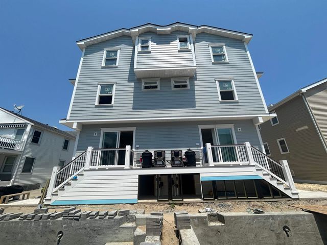 a front view of a house with a balcony