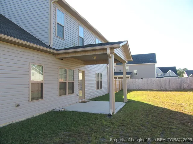 a view of a house with a swimming pool