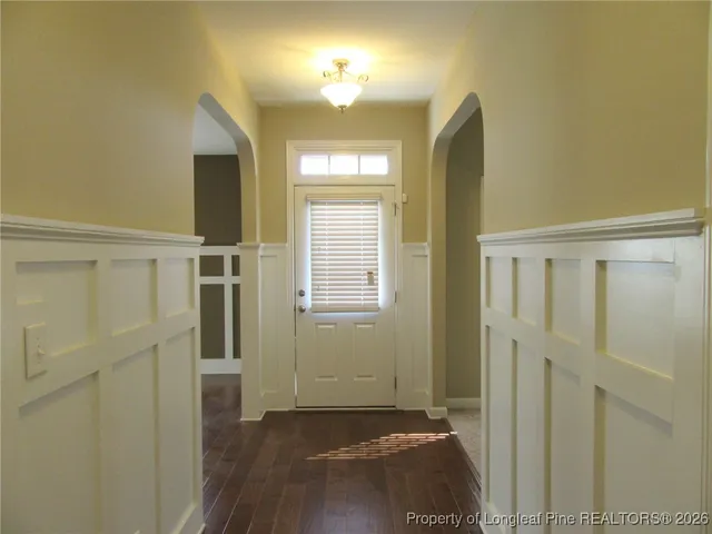 a view of a bathroom with a sink and a mirror