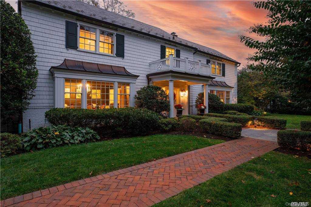 150 Elderfields Road Manhasset, NY 11030 - Photo 1 of 1 a front view of a house with a yard