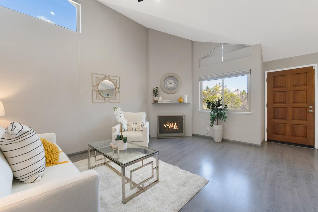 2865 South Bascom Avenue, Unit 902 San Jose, CA 95124 - Photo 14 of 29 a living room with furniture and a fireplace