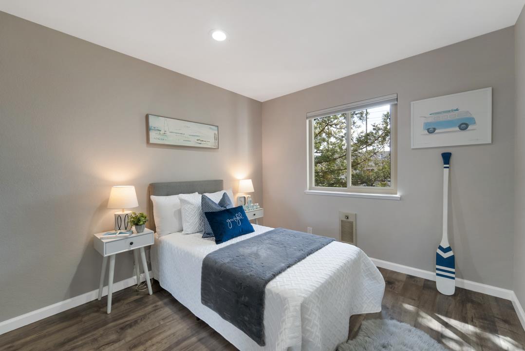 2865 South Bascom Avenue, Unit 902 San Jose, CA 95124 - Photo 16 of 29 a bedroom with a bed and a window