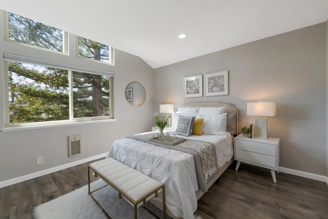 2865 South Bascom Avenue, Unit 902 San Jose, CA 95124 - Photo 18 of 29 a bedroom with a bed and a large window