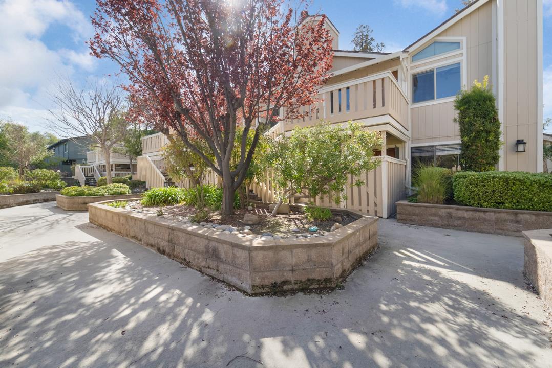 2865 South Bascom Avenue, Unit 902 San Jose, CA 95124 - Photo 24 of 29 a view of a house with a yard and fountain