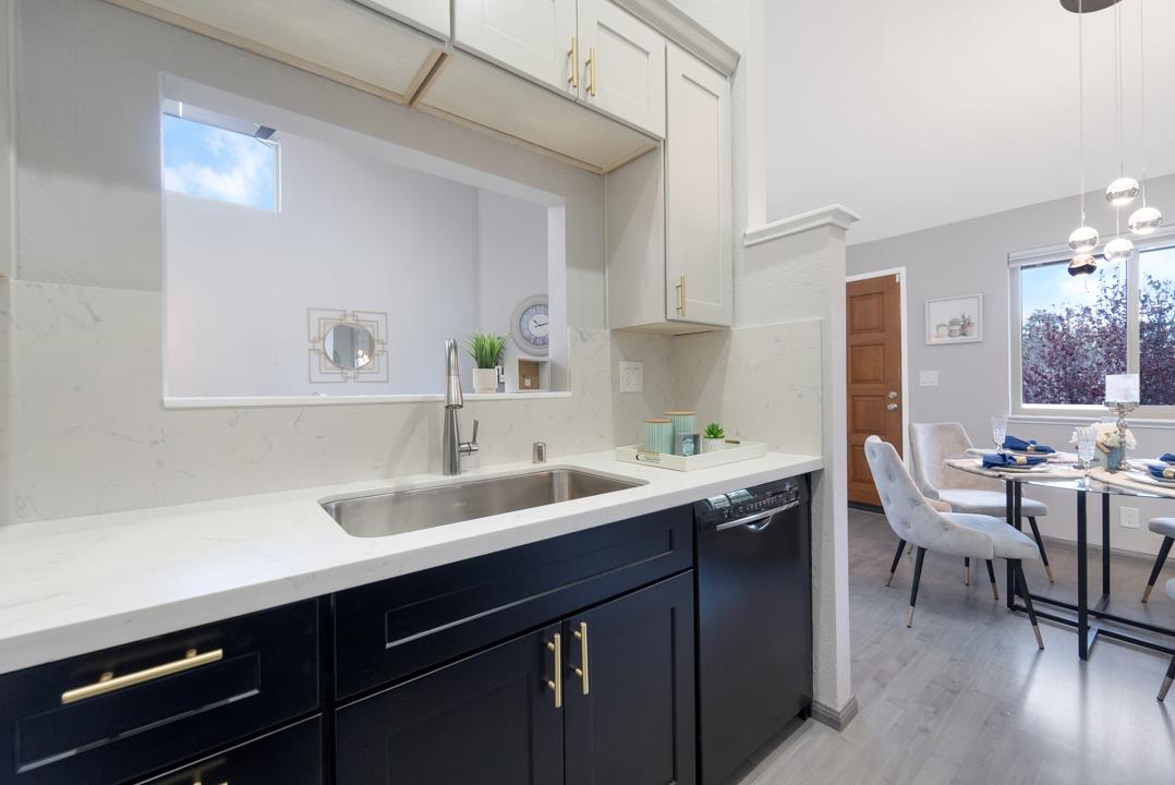 2865 South Bascom Avenue, Unit 902 San Jose, CA 95124 - Photo 10 of 29 a kitchen with a sink cabinets and window