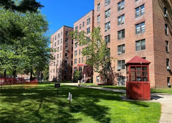 front view of a building with a yard