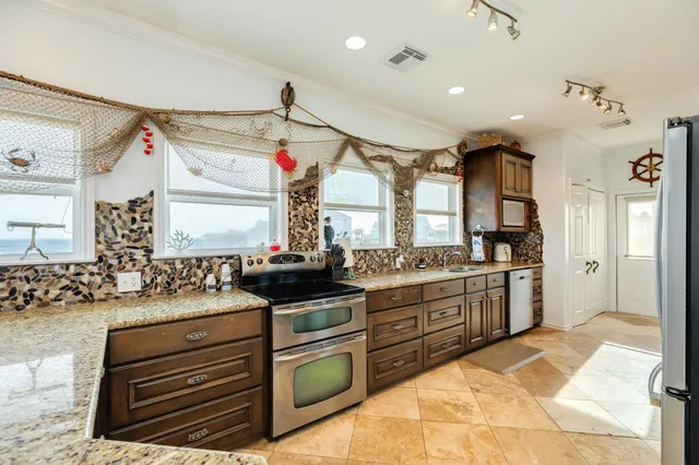 $460,000 | 13111 Gulf Beach Drive, Freeport, TX 77541