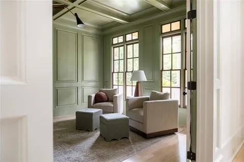 a view of a livingroom with furniture and wooden floor