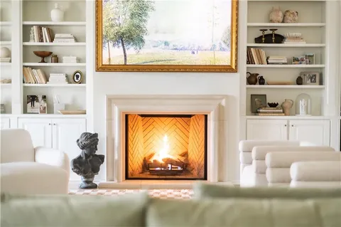 a kitchen with stainless steel appliances granite countertop a stove and a refrigerator